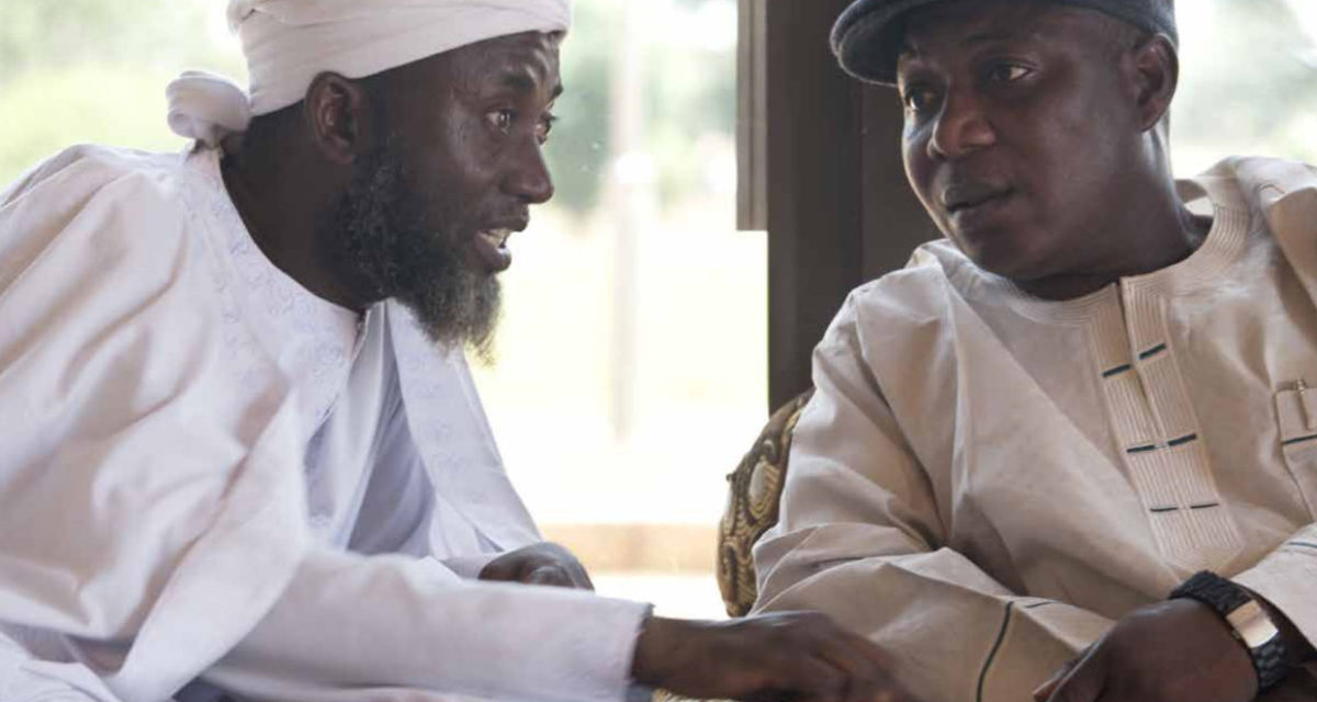 Pastor James Wuye und Imam Muhammad Ashafa vermitteln gemeinsam im Norden Nigerias zwischen Christen und Muslimen | Berghof Foundation | Foto: Uli Reinhardt Pastor James Wuye und Imam Muhammad Ashafa vermitteln gemeinsam im Norden Nigerias zwischen Christ:innen und Muslim:innen | Berghof Foundation | Foto: Uli Reinhardt